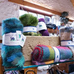 luxury Donegal mohair scarves in turquoise, green and purple