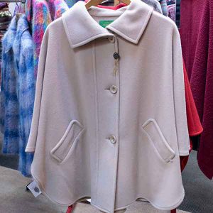 Single colour ivory wool cape with pockets