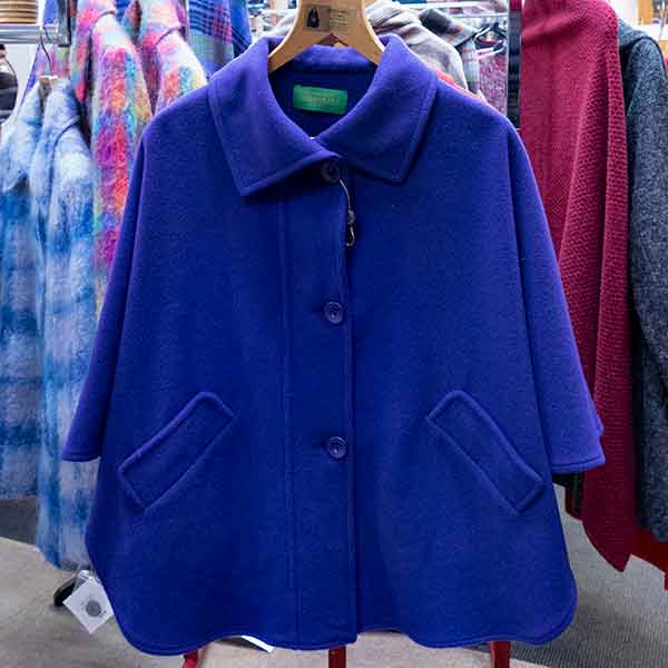 Single colour royal blue wool cape with pockets - abbey mill