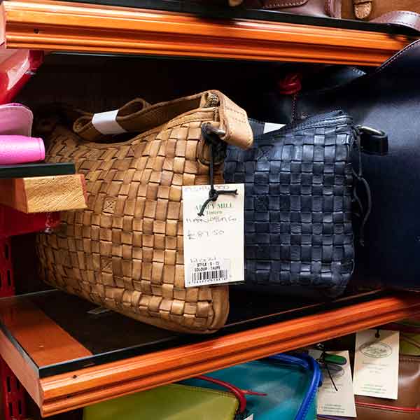 Ashwood woven leather shoulder handbags in tan and navy £87.50