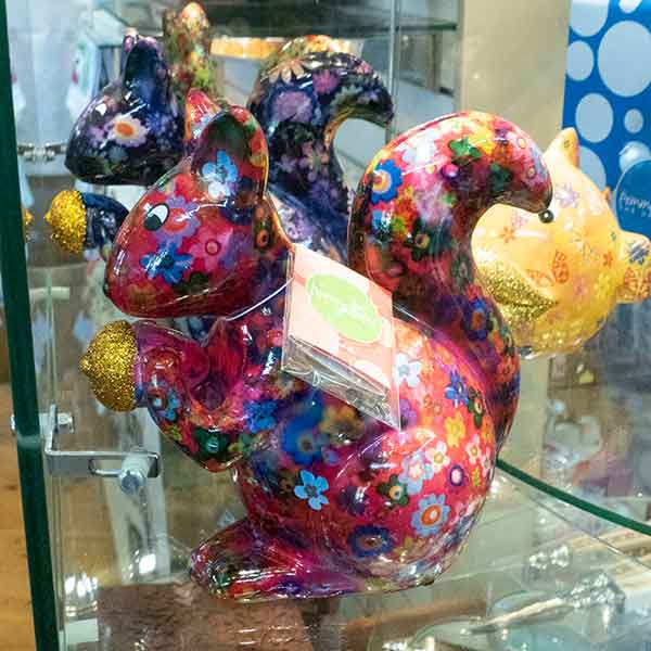 Pink and purple golden squirrel money boxes by Pomme-pidou, £17.50
