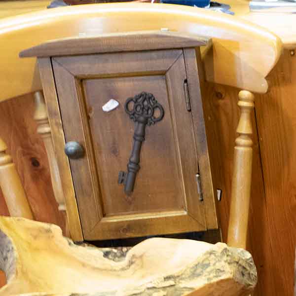 Wall mounted wooden key box with decorative metal key design £65.00