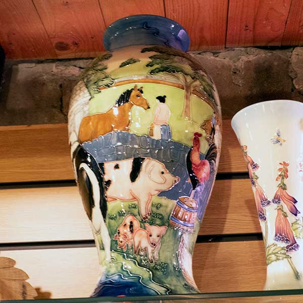 enamelled ceramic farm scene vase